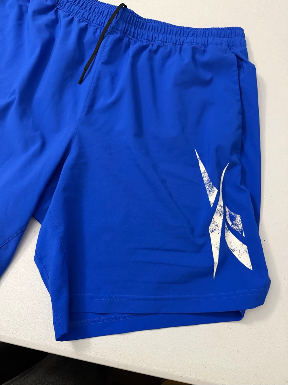 Reebok Men's Royal Blue Athletic Shorts with White Logo